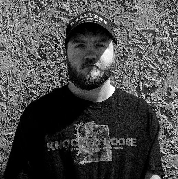 Black-and-white portrait of Chayse Burmeister